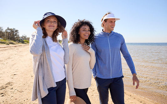 A group of people wear Solbari UPF 50+ sun protective clothing and hats.