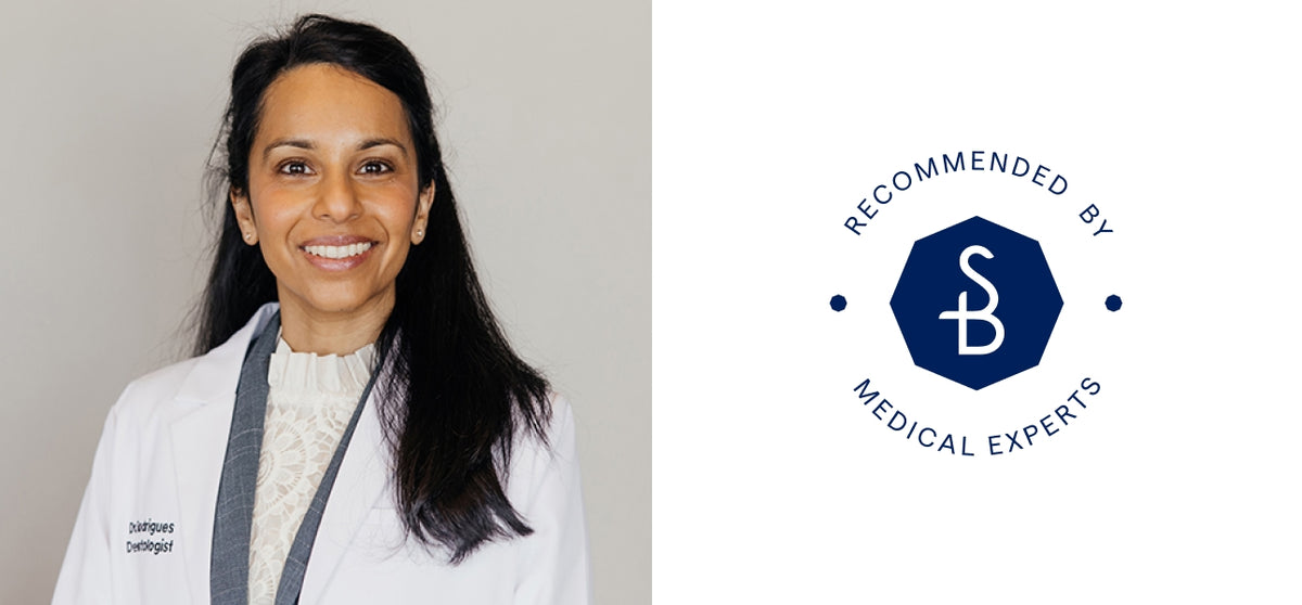 Woman in a white coat with a 'Recommended by Medical Experts' logo on a gray background