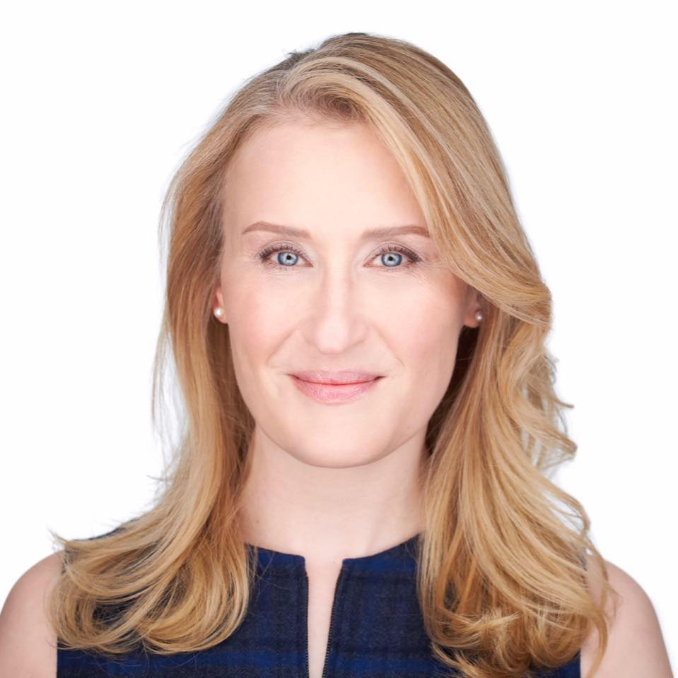 Woman with blonde hair and blue eyes on a white background
