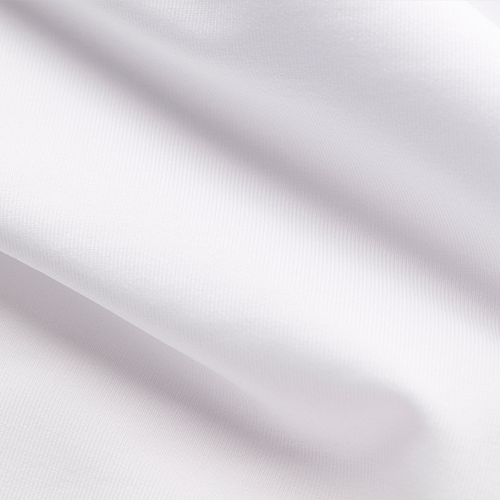 Close-up of white fabric with subtle texture